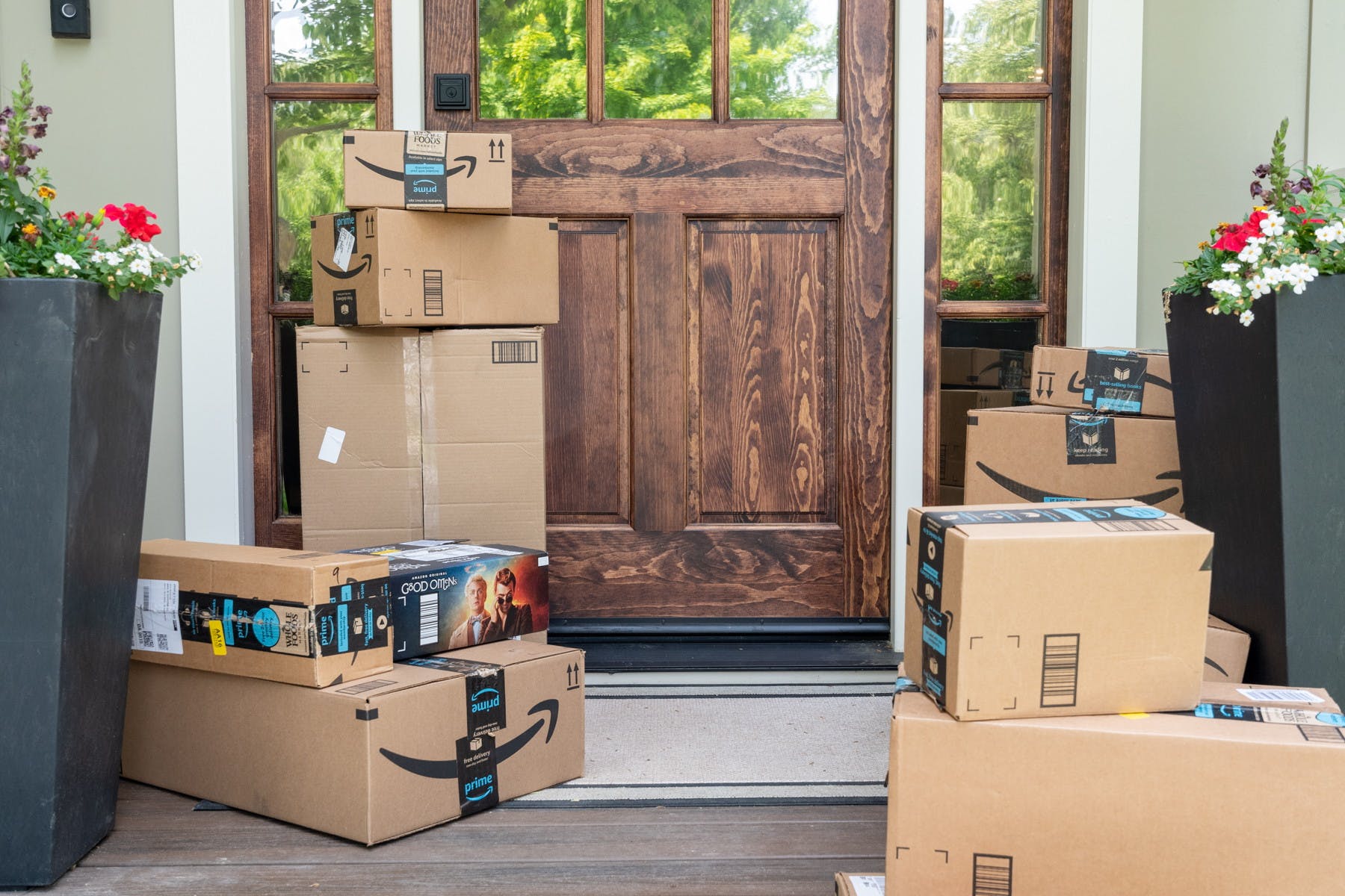 stacks of wasteful amazon boxes